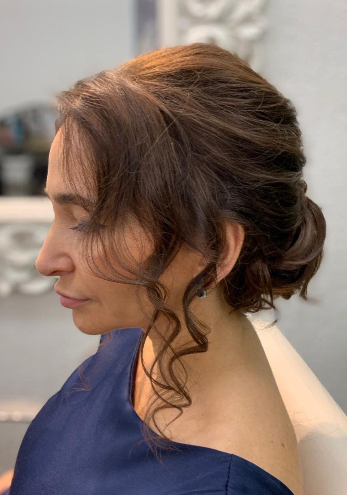 Collarbone Dark Brown Updo With Loose Tendrils Collarbone Dark Brown Updo With Loose Tendrils — Professional Hairstyles 2027