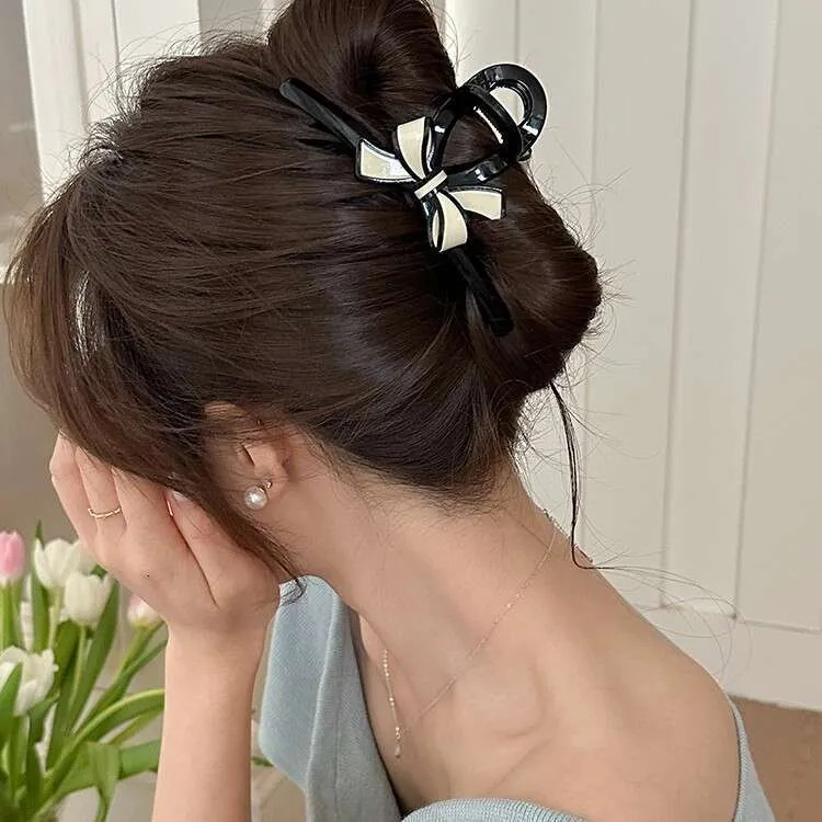 Side View Close Crop Visual Idea — Claw Clip Bun 2027
