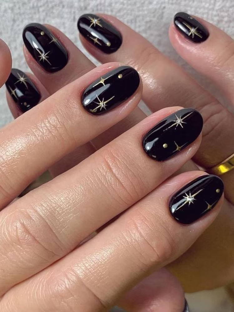 Gold Starbursts And Dots On Accent Nails Visual Idea Gold Starbursts And Dots On Accent Nails Visual Idea — Black Nails 2027