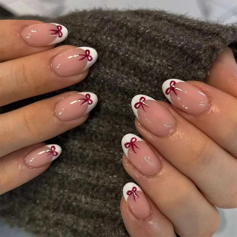 Visual Idea — Each Tip Is Decorated With A Small Visual Idea — Each Tip Is Decorated With A Small — Christmas Almond Nails 2026