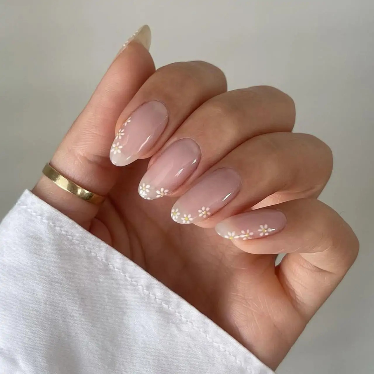 Sheer Nude with White Floral Tip Almond Nails Sheer Nude with White Floral Tip Almond Nails — Spring Nail Colors 2027