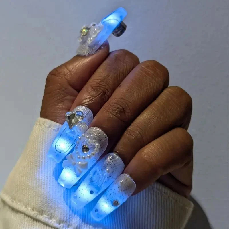 Visual Idea — Each Nail Is Adorned With Silver Glitter Visual Idea — Each Nail Is Adorned With Silver Glitter — Coachella Nails 2027
