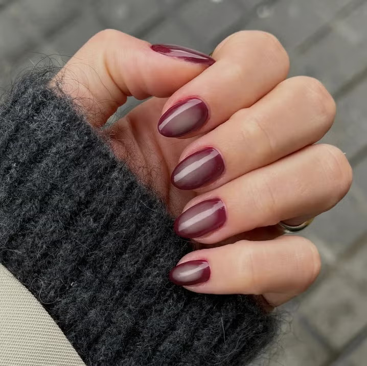 Burgundy to Sheer Nude Ombre Ovals Burgundy to Sheer Nude Ombre Ovals — Burgundy Christmas Nails 2026