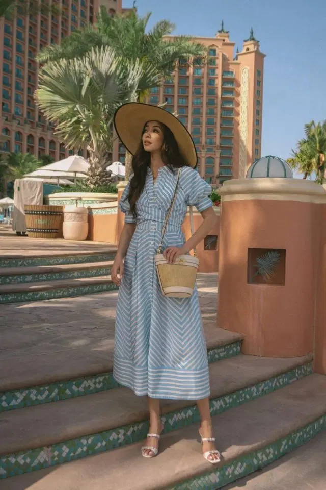 Striped Midi Dress with Straw Hat for Resort Chic Striped Midi Dress with Straw Hat for Resort Chic — Dubai Outfits 2027