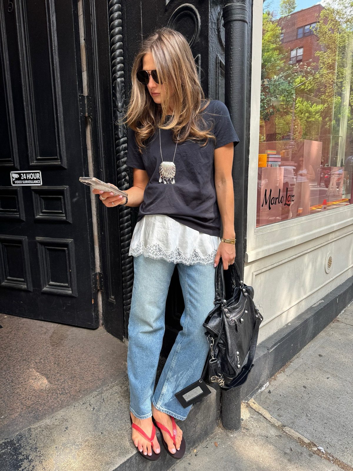 Layered Casual: Lace Camisole Under a Black T-Shirt with Wide-Leg Jeans Layered Casual: Lace Camisole Under a Black T-Shirt with Wide-Leg Jeans — Scene Outfits 2027