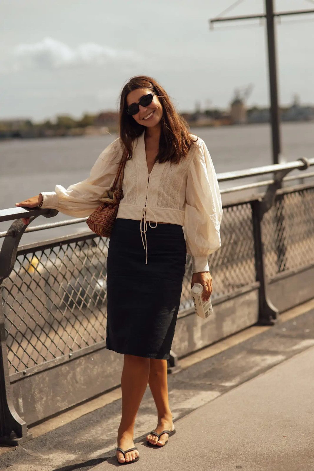 Cream Voluminous Sleeve Blouse with Black Pencil Skirt for a Chic Confirmation Cream Voluminous Sleeve Blouse with Black Pencil Skirt for a Chic Confirmation — Confirmation Outfits 2027