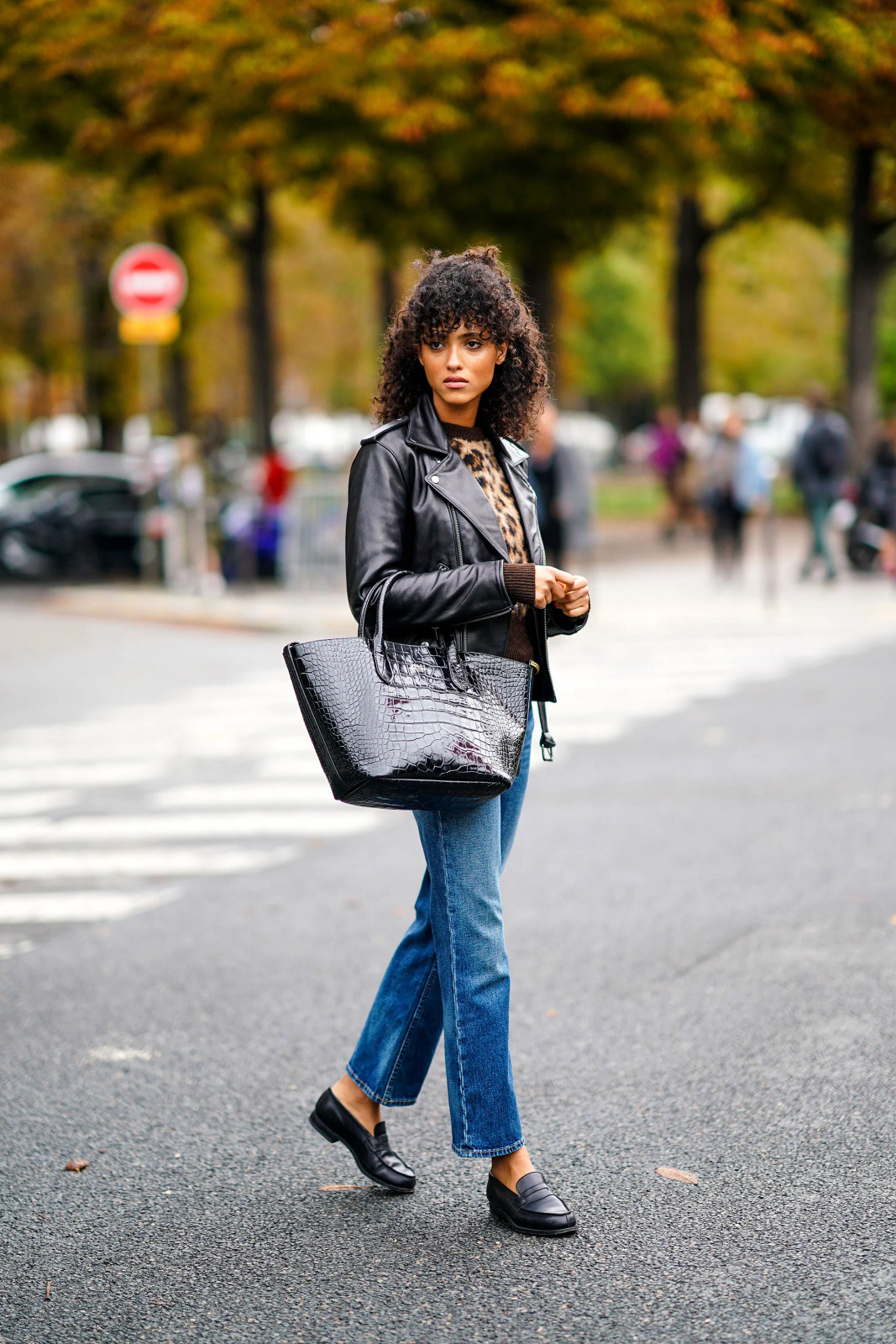 Edgy Casual: Biker Jacket, Leopard Print, and Jeans with Loafers — Chunky Loafers Outfits 2027