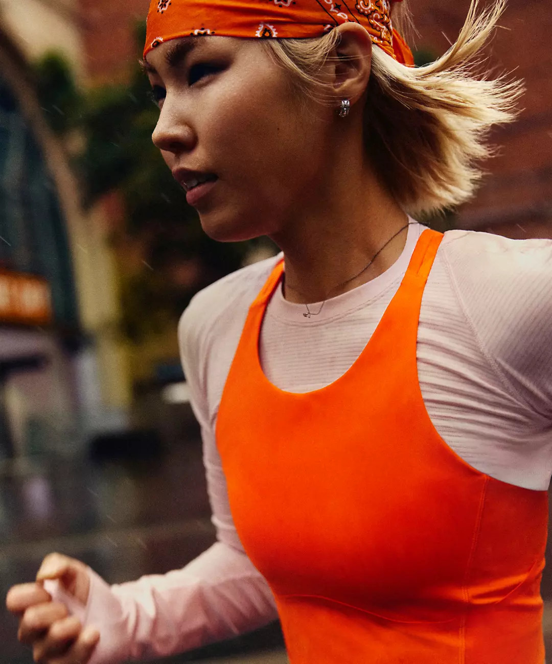Pink Long-Sleeve Shirt and Orange Sports Bra with Bandana Pink Long-Sleeve Shirt and Orange Sports Bra with Bandana — Running Outfits for Women 2027