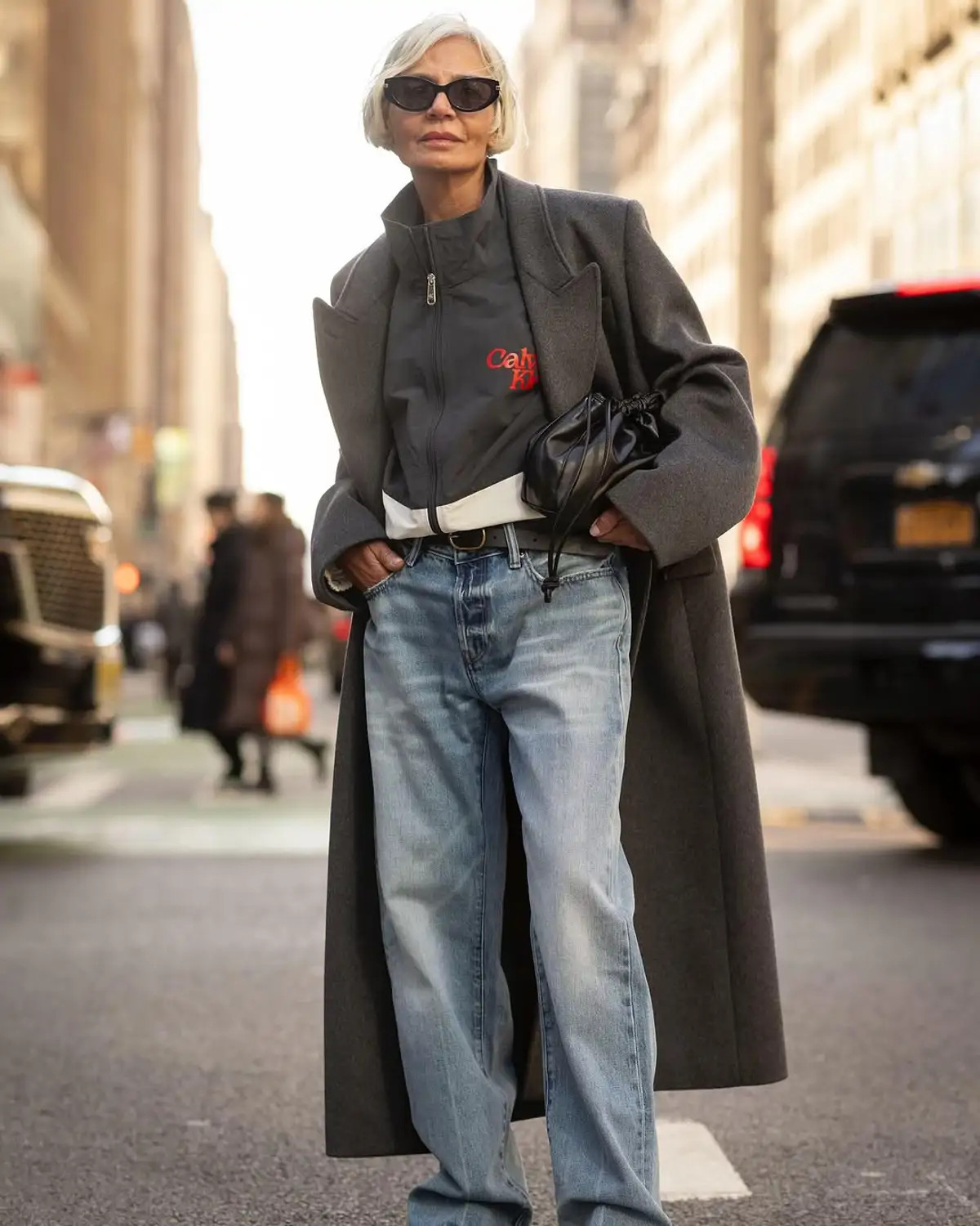 Longline Grey Coat Over Zip-Up Jacket and Wide-Leg Jeans Longline Grey Coat Over Zip-Up Jacket and Wide-Leg Jeans — Winter Neutral Outfits 2027
