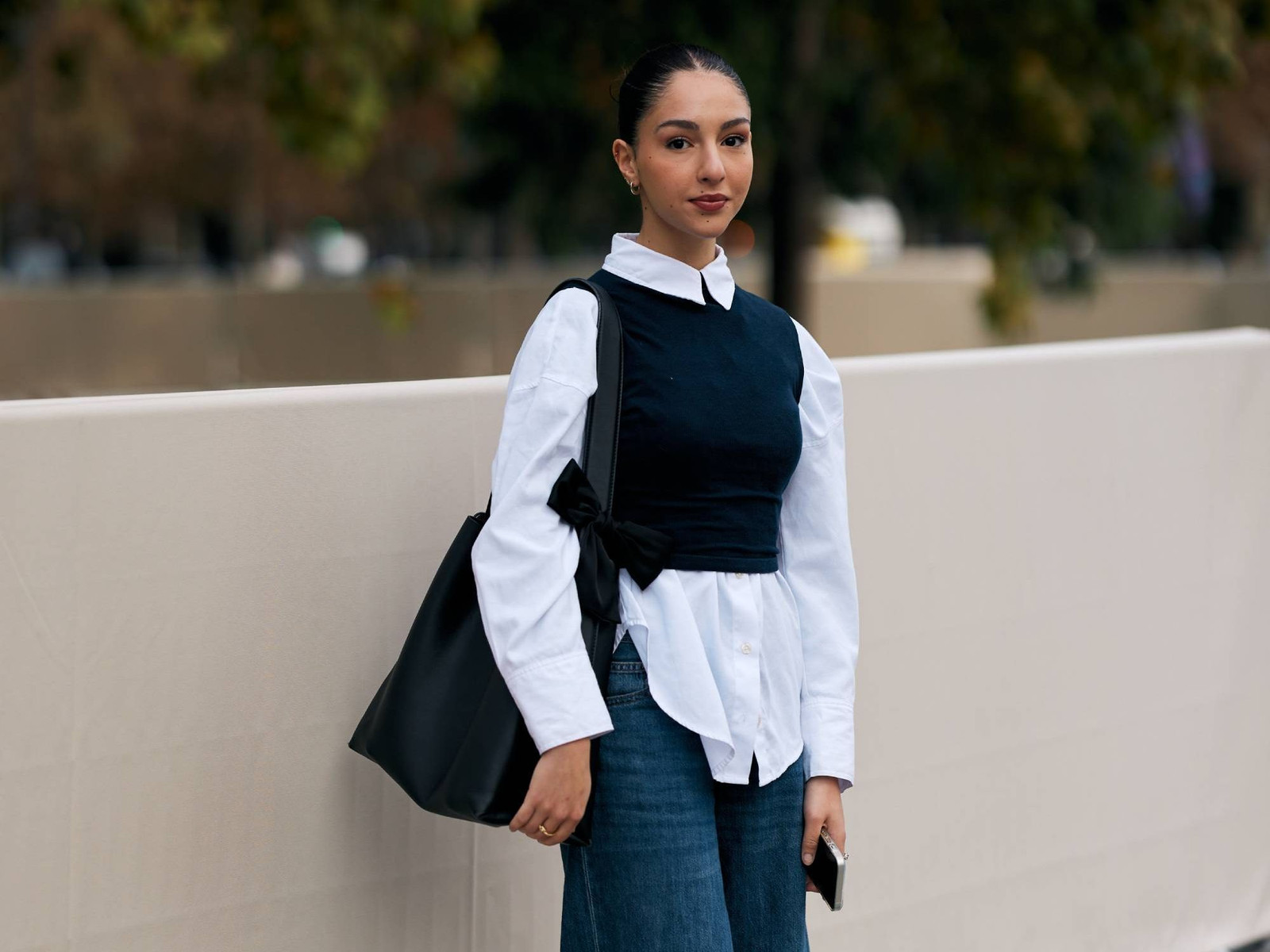 Navy Cropped Vest Over White Shirt with Blue Jeans Navy Cropped Vest Over White Shirt with Blue Jeans — Sweater and Jeans Outfits 2027