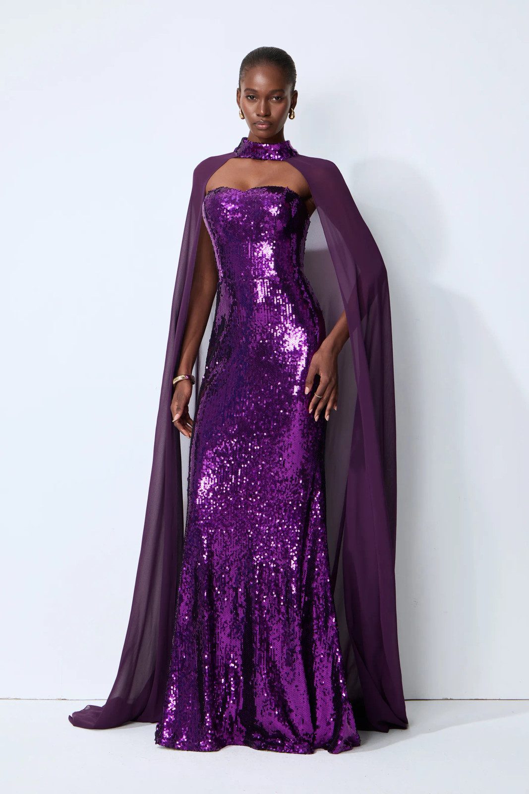 Glamorous Statement: Shimmering Purple Sequined Gown with a Chiffon Cape Glamorous Statement: Shimmering Purple Sequined Gown with a Chiffon Cape — Purple Wedding Guest Outfits 2027