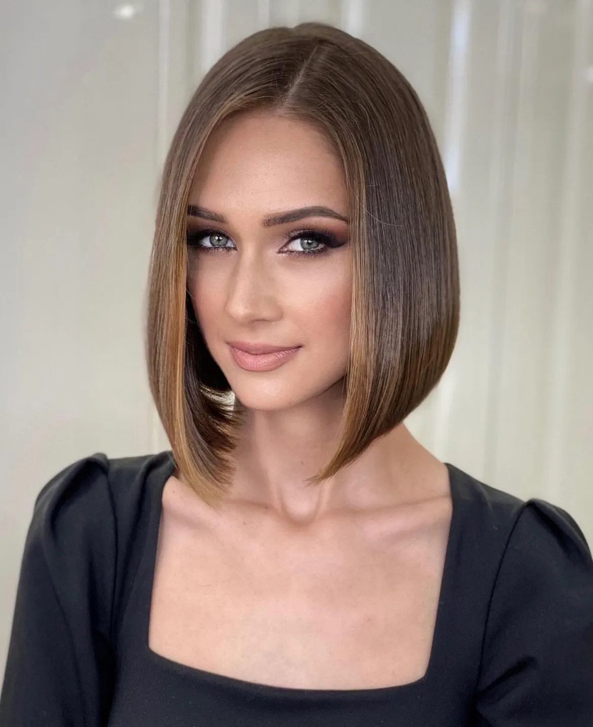 Sleek Chin Bob With Caramel Highlights Sleek Chin Bob With Caramel Highlights — Brown Bob 2027