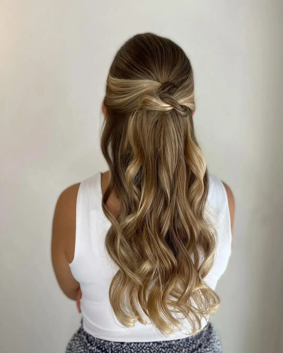 Half-Up Half-Down With Twisted Sections Visual Idea Half-Up Half-Down With Twisted Sections Visual Idea — Winter Wedding Hairstyles 2027