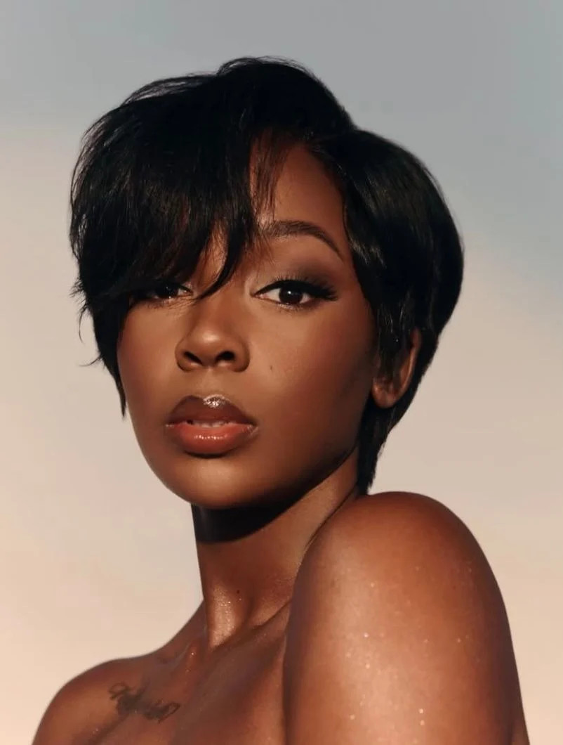 Smooth Black Pixie With Face-Framing Bangs Smooth Black Pixie With Face-Framing Bangs — Pixie Quick Weave Styles 2027