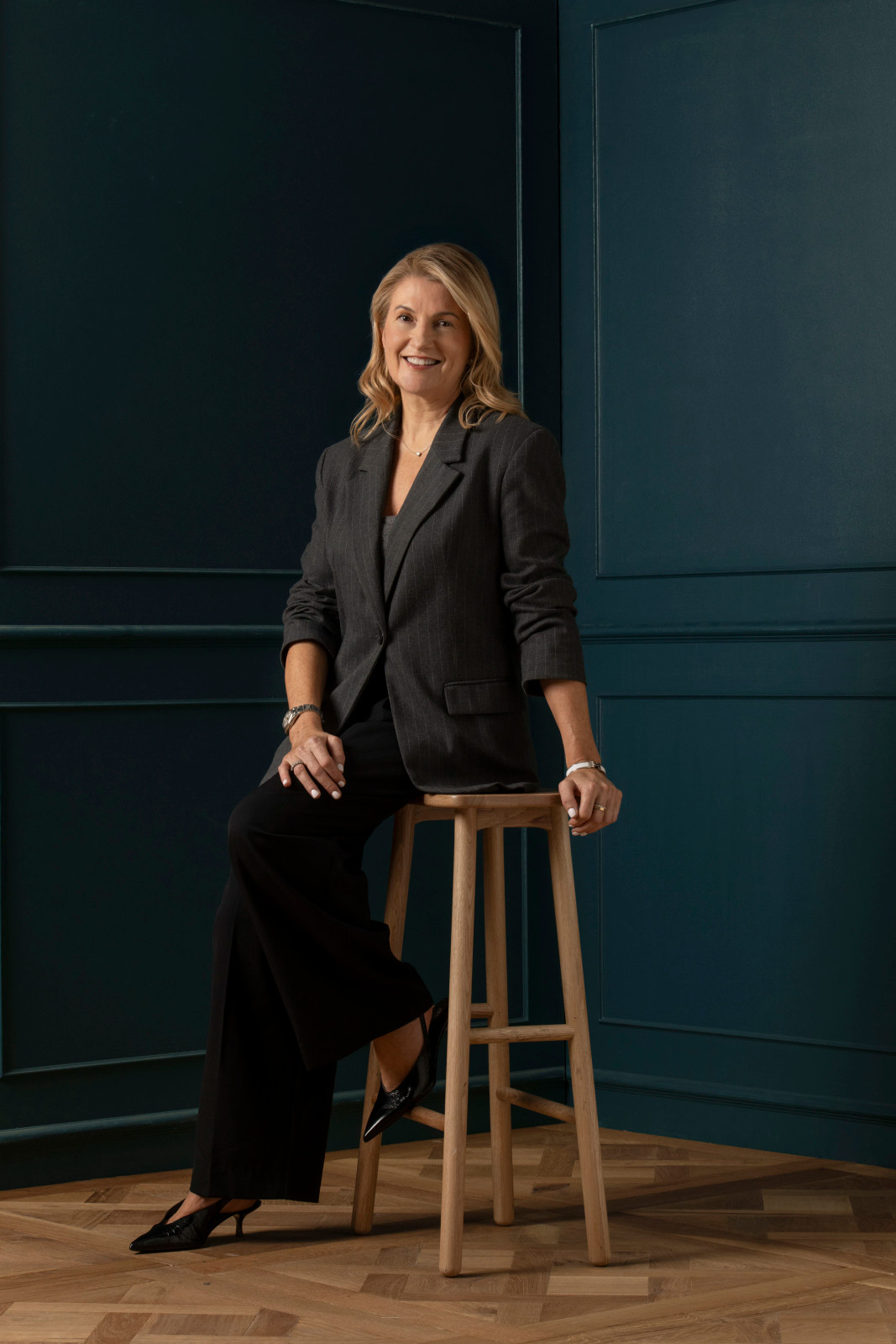 Modern Pinstripe Blazer and Black Trousers for a Contemporary Edge Modern Pinstripe Blazer and Black Trousers for a Contemporary Edge — Realtor Outfits 2027