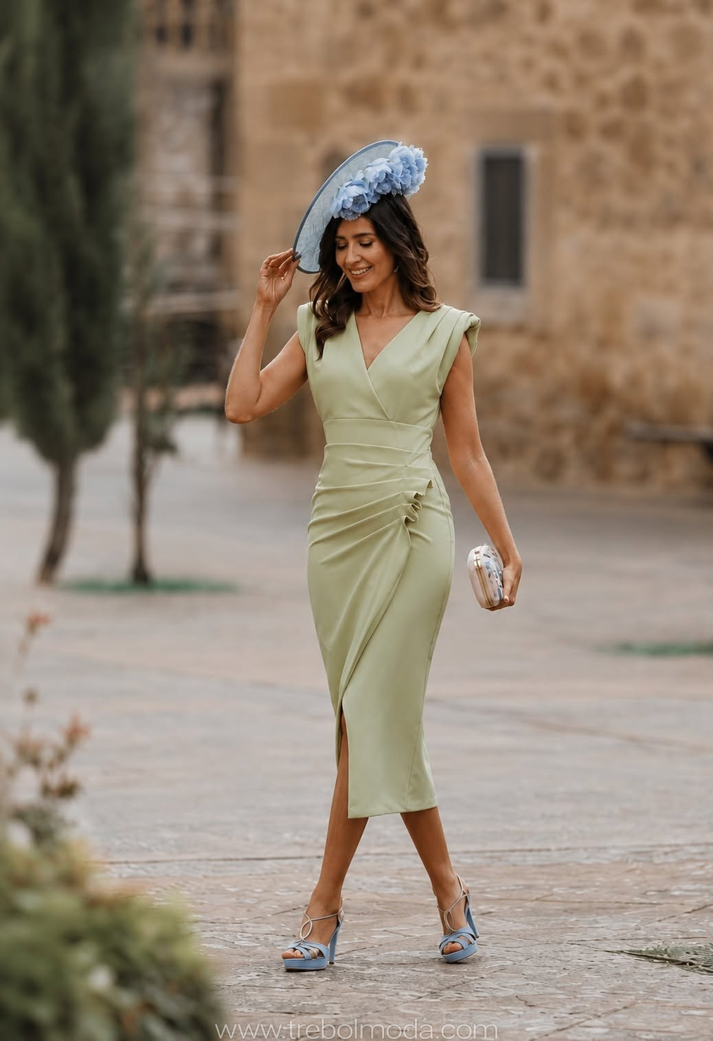 Light Green Ruched Midi Dress with a Statement Fascinator Light Green Ruched Midi Dress with a Statement Fascinator — Wedding Guest Outfits 2027 for Women Over 50