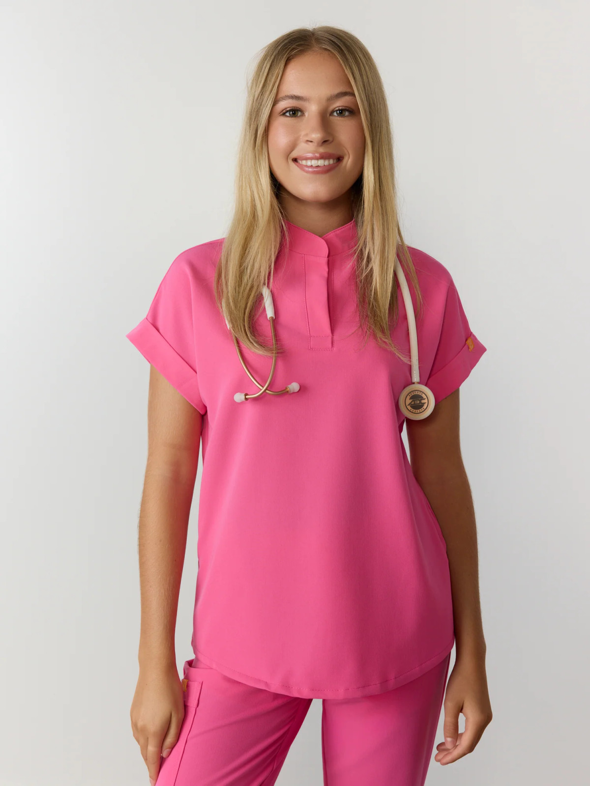 Vibrant Pink Scrubs with Rolled Cuffs and Stethoscope Vibrant Pink Scrubs with Rolled Cuffs and Stethoscope — Scrubs Outfits 2027