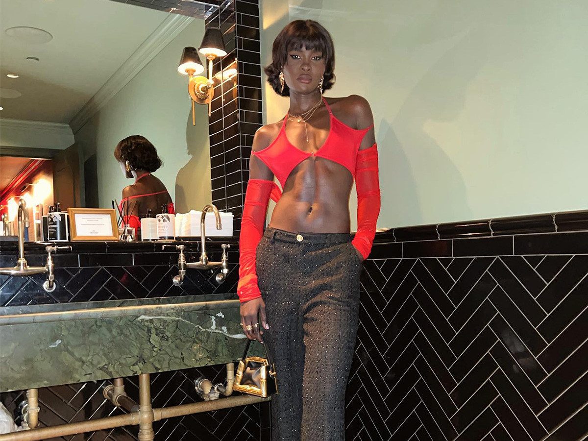 Bold Red Halter Top with Tweed Trousers and Mesh Arm Warmers Bold Red Halter Top with Tweed Trousers and Mesh Arm Warmers — Steakhouse Outfits 2027