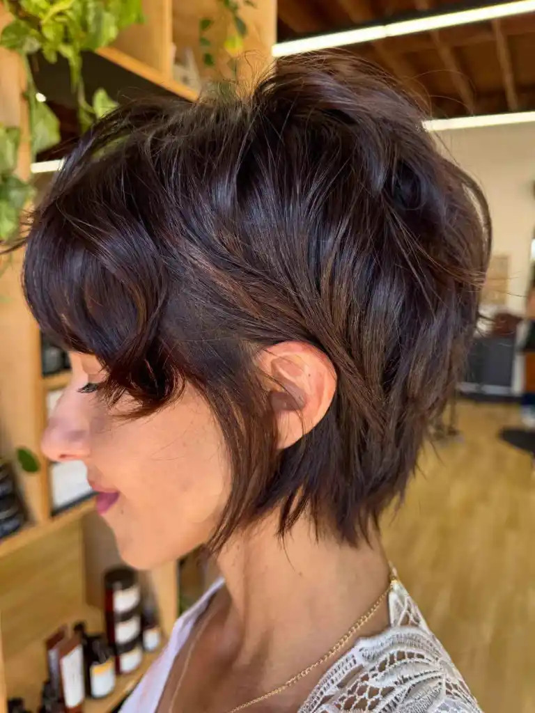 Textured Dark Shag With Curtain Bangs Textured Dark Shag With Curtain Bangs — Summer Hairstyles 2027