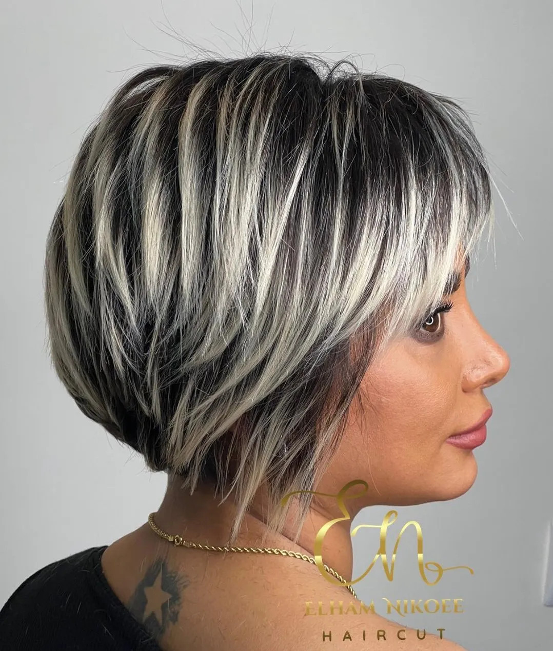 Dark Base With Bold Blonde Highlights Dark Base With Bold Blonde Highlights — Pixie Haircuts 2027