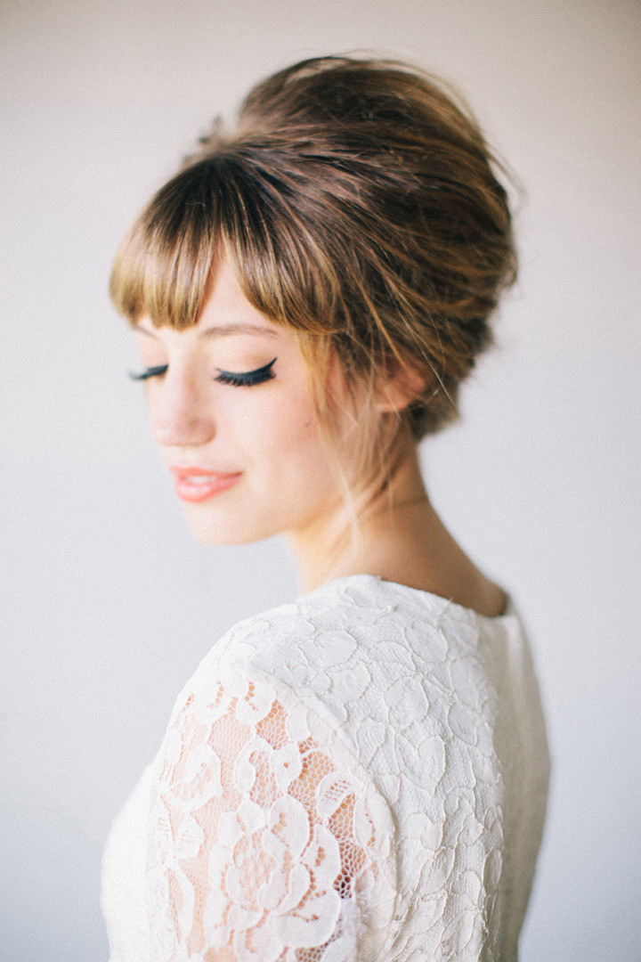 Retro Updo With Blunt Eyebrow Bangs Retro Updo With Blunt Eyebrow Bangs — Prom Hairstyles 2027 with Bangs