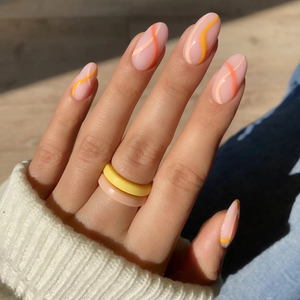 Visual Idea — Wavy Lines In Yellow Round Nails 2027