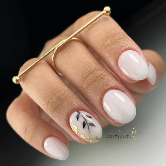 Black Leaf Gold Foil Accent Oval Nails Black Leaf Gold Foil Accent Oval Nails — Round Nails 2027