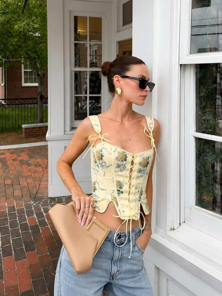 Chic Brunch: Pale Yellow Floral Corset with Denim Chic Brunch: Pale Yellow Floral Corset with Denim — Floral Corset Top Outfits 2027