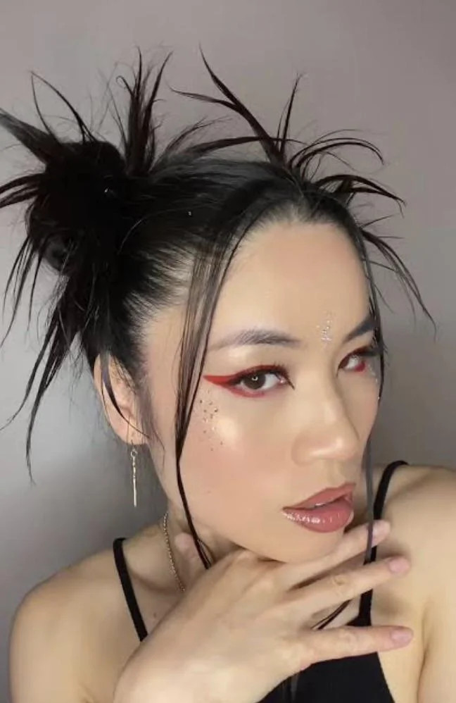 Messy Bun With Spiky Tendrils Messy Bun With Spiky Tendrils — Punk Hairstyles 2027