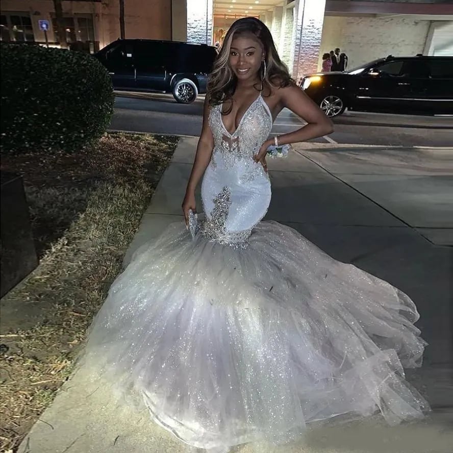 Silver and white sparkly mermaid gown with glitter train Silver and white sparkly mermaid gown with glitter train — Mermaid Quinceanera Dress 2027