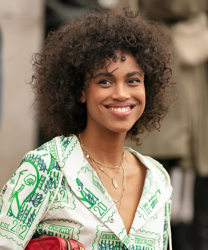 Layered Afro With Short Fringe Layered Afro With Short Fringe — Natural Hairstyles 2027 for Black Women