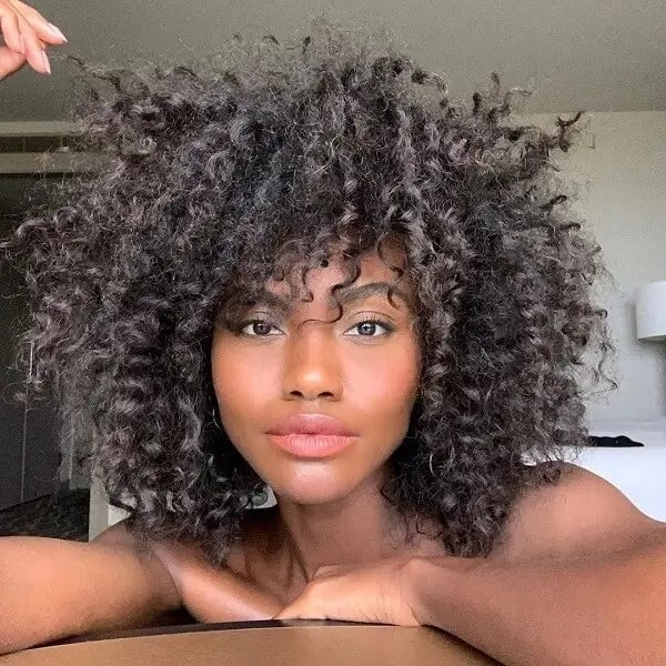 Shoulder Length Air Dried Curls With Curtain Bangs Shoulder Length Air Dried Curls With Curtain Bangs — Natural Hairstyles 2027 for Black Women