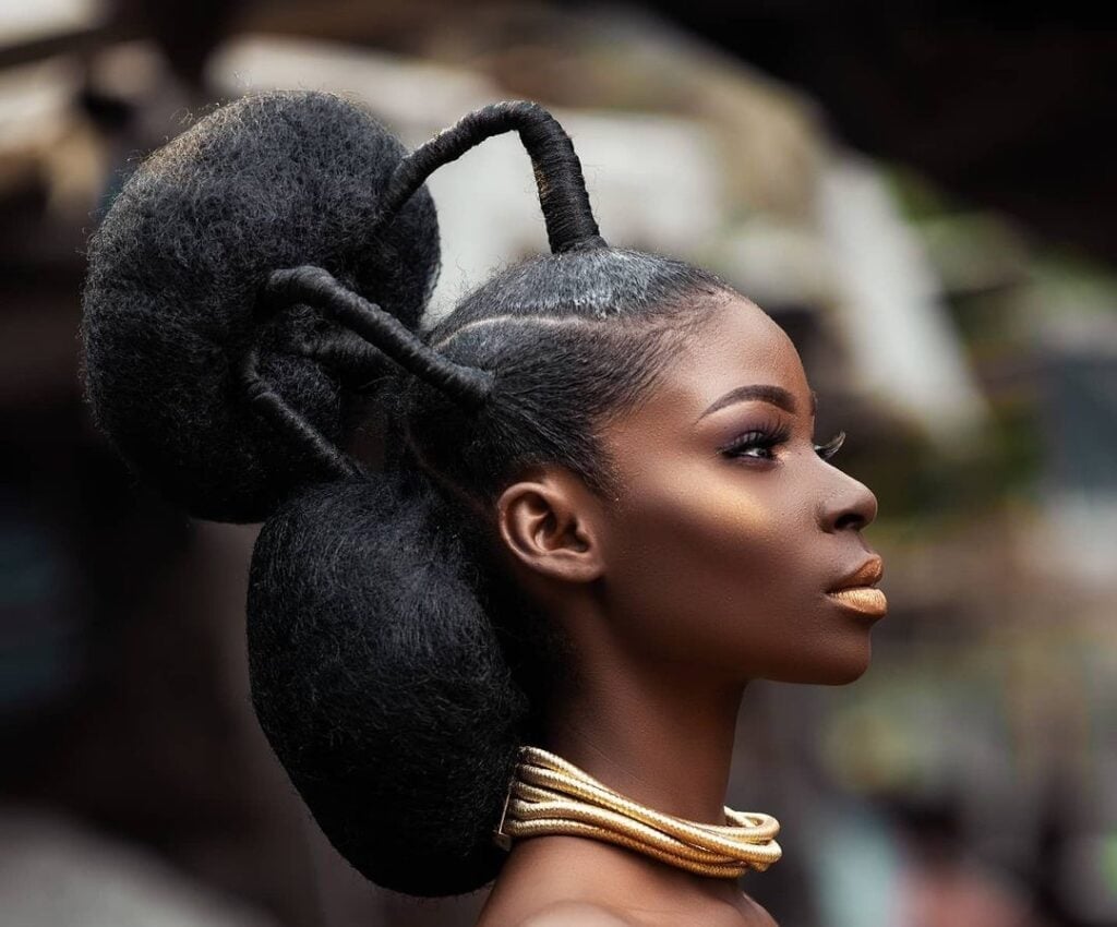 Sculptural Afro Updo With Middle Part Sculptural Afro Updo With Middle Part — Natural Hairstyles 2027 for Black Women