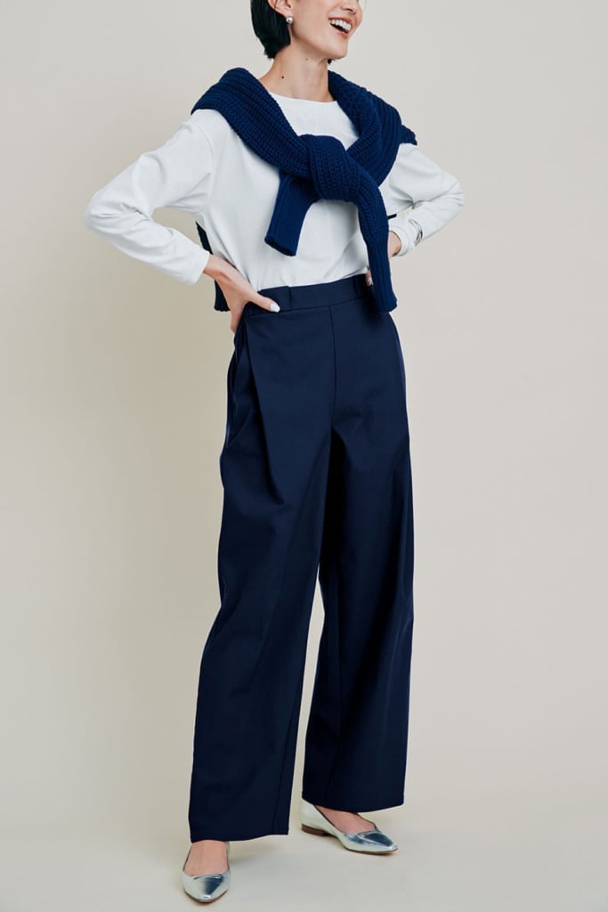 Navy Straight Leg Pants With Sweater Tied Over Shoulders — Navy Blue Straight Leg Pants Outfits 2027
