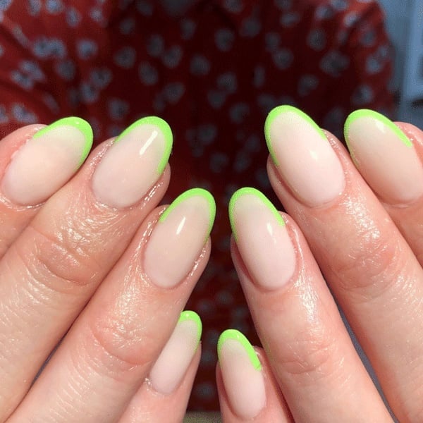 Medium Oval Sheer Nude Neon Green French Tips, Close-Up Take Medium Oval Sheer Nude Neon Green French Tips, Close-Up Take — Neon Oval Nails 2027