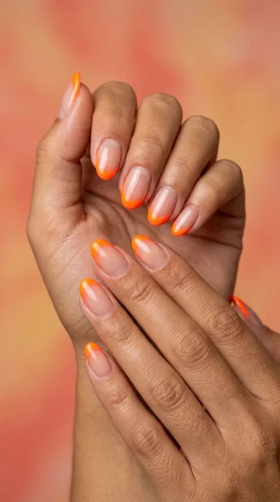 Short Oval Sheer Nude Neon Orange French Tips, Summery Color Short Oval Sheer Nude Neon Orange French Tips, Summery Color — Neon Oval Nails 2027