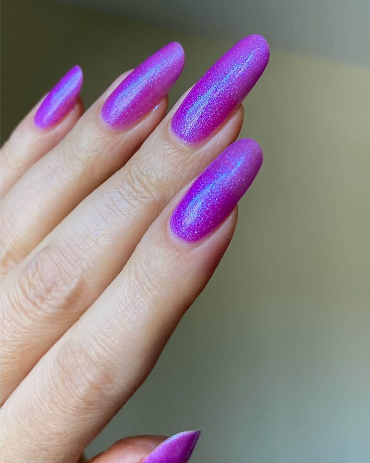 Long Oval Shimmering Iridescent Purple Blue Nails Long Oval Shimmering Iridescent Purple Blue Nails — Neon Oval Nails 2027