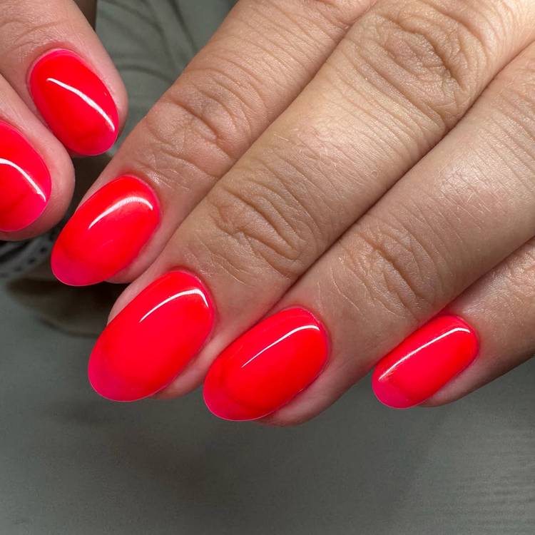 Oval Medium Neon Red Pink Glossy Nails, Close-Up Take Oval Medium Neon Red Pink Glossy Nails, Close-Up Take — Neon Oval Nails 2027
