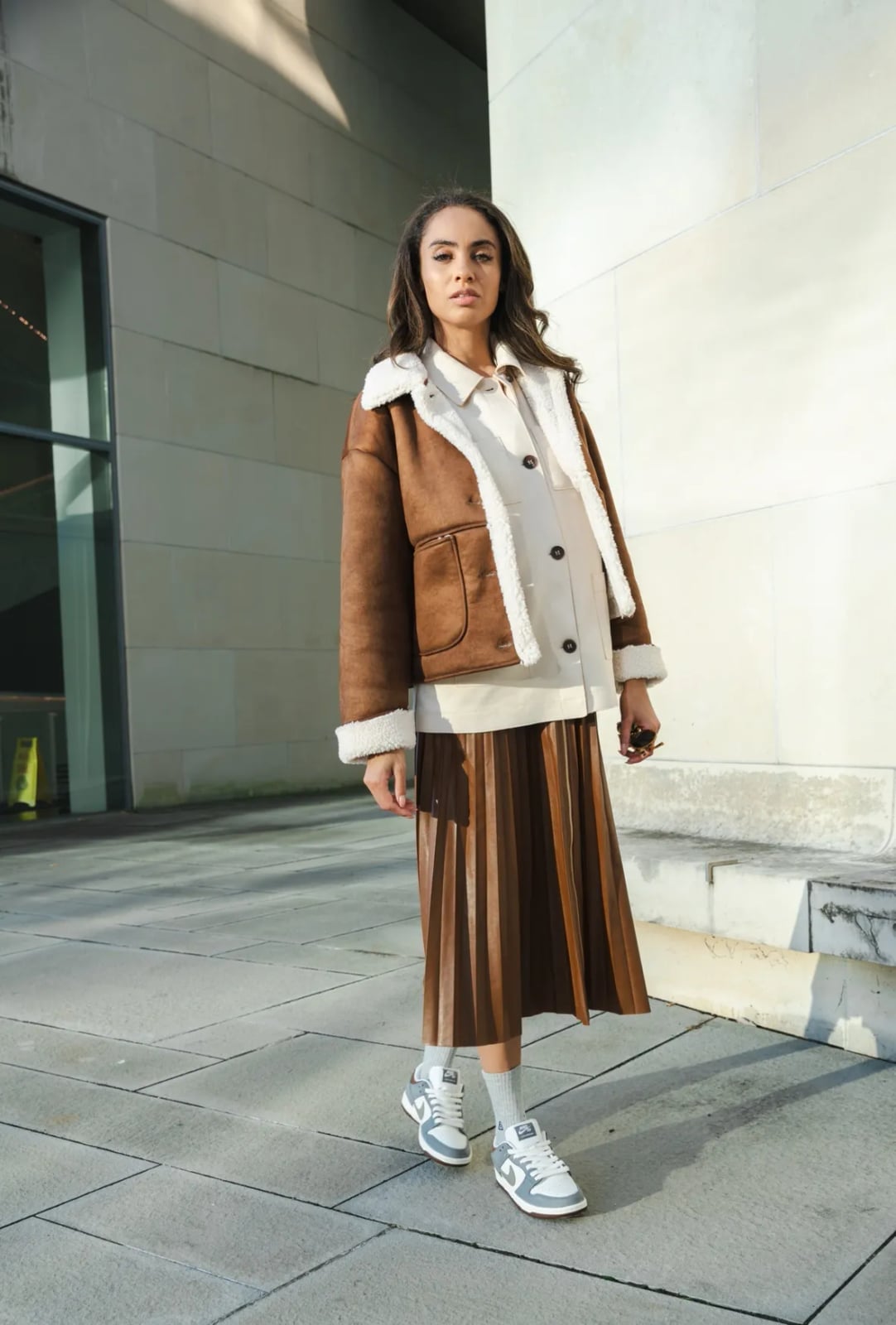 Shearling Jacket and Gray Dunks with a Pleated Skirt Shearling Jacket and Gray Dunks with a Pleated Skirt — Nike Dunk Outfits 2027