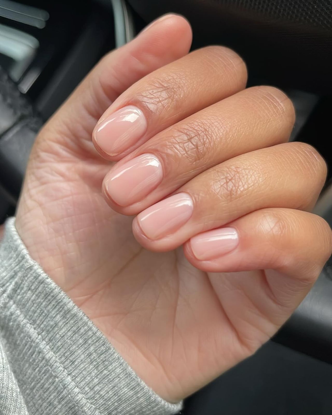 Sheer Nude Glossy Short Oval Nails with White Line Art Sheer Nude Glossy Short Oval Nails with White Line Art — Nude Nails 2027 for Short Nail Beds