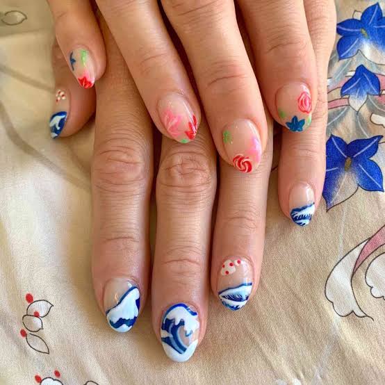 Short Oval With Hand-Painted Waves And Flowers Short Oval With Hand-Painted Waves And Flowers — Ocean Nails 2027