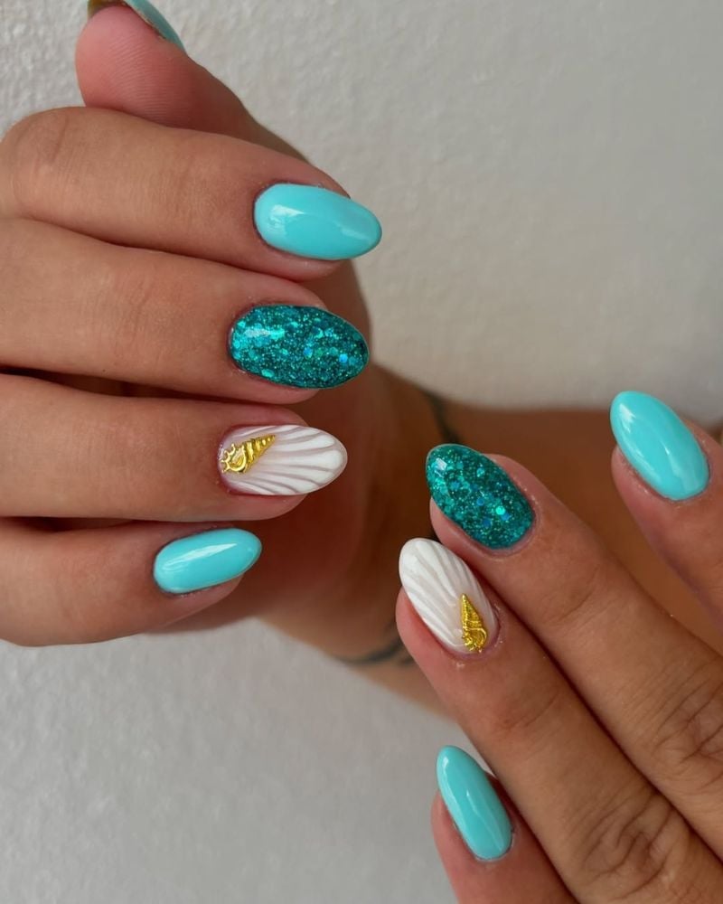 Glossy Turquoise Nails With Glitter Seashells Glossy Turquoise Nails With Glitter Seashells — Ocean Nails 2027