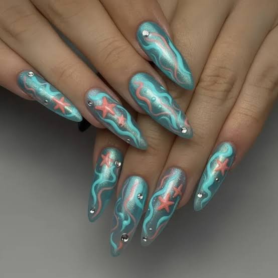 Shimmering Teal Stiletto Nails With Pink Swirls Shimmering Teal Stiletto Nails With Pink Swirls — Ocean Nails 2027