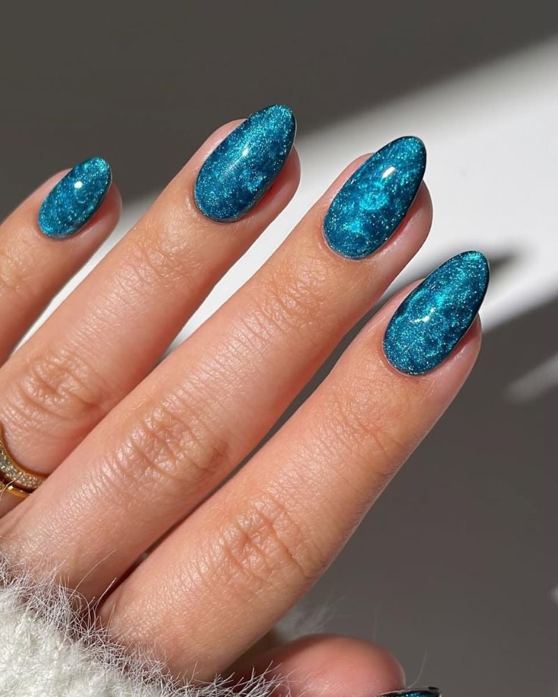 Medium Oval Nails With Deep Teal Shimmer Glitter Medium Oval Nails With Deep Teal Shimmer Glitter — Ocean Nails 2027
