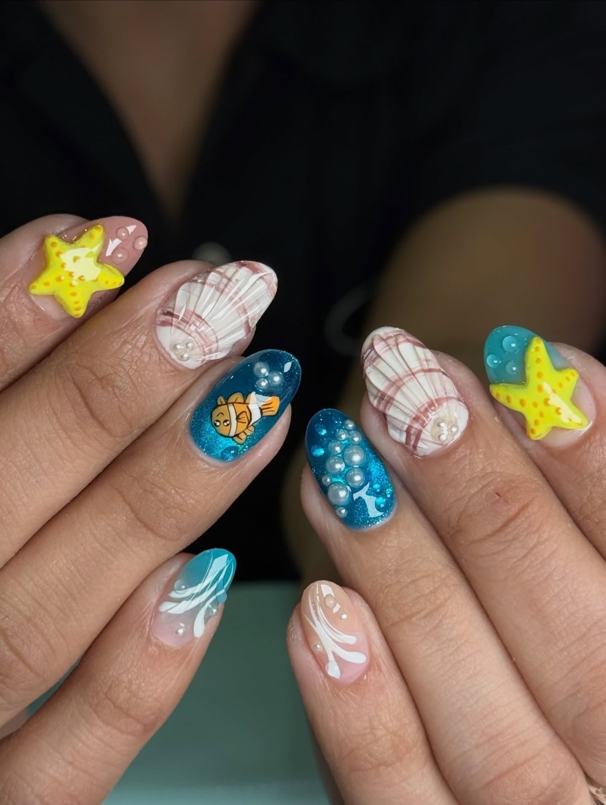 Medium Oval With Cartoon Fish And Seashells Medium Oval With Cartoon Fish And Seashells — Ocean Nails 2027