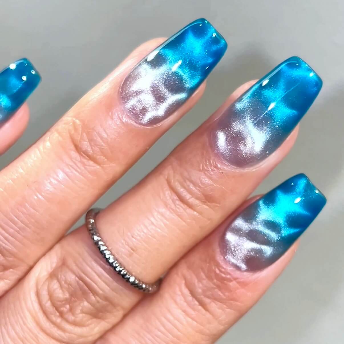 Medium Square Magnetic Cat-Eye Blue Swirls Medium Square Magnetic Cat-Eye Blue Swirls — Ocean Nails 2027