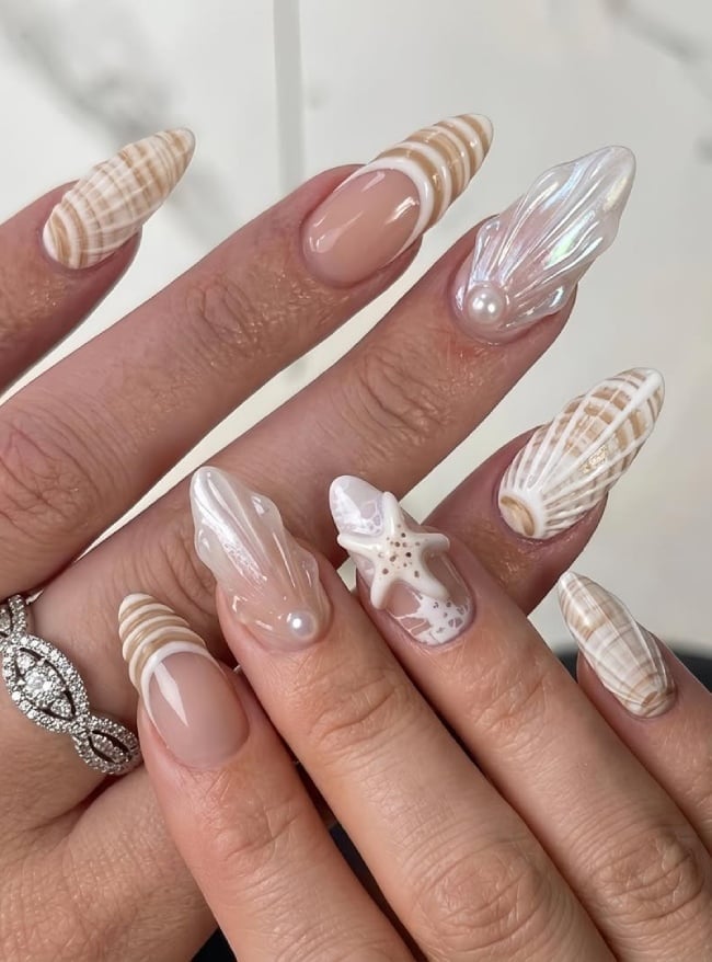Nude French Tips With 3D Seashell Charms Nude French Tips With 3D Seashell Charms — Ocean Nails 2027