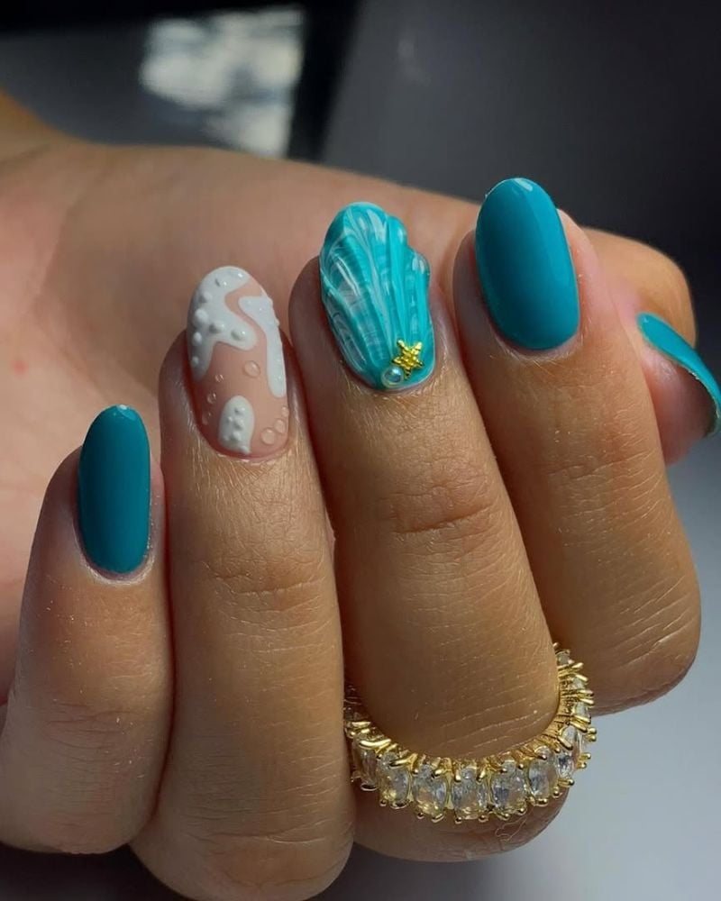 Teal Oval Nails With 3D Seashell Accent Teal Oval Nails With 3D Seashell Accent — Ocean Nails 2027