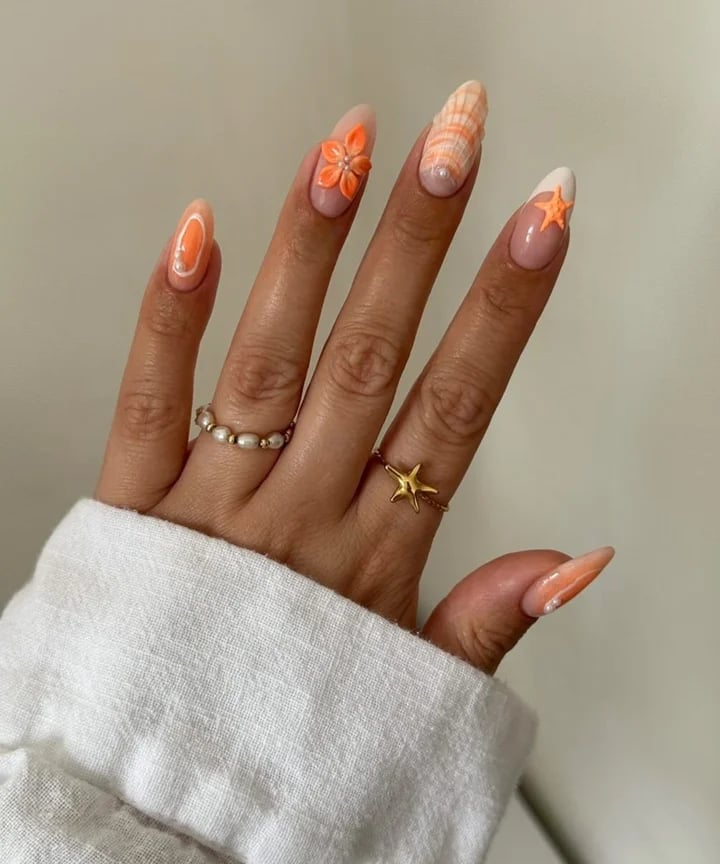 Nude Almond Nails With Orange Accents And Flower Nude Almond Nails With Orange Accents And Flower — Ocean Nails 2027