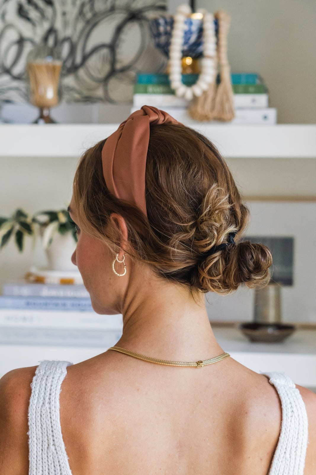 Brown Updo With Wispy Bangs And Knotted Headband Brown Updo With Wispy Bangs And Knotted Headband — Padded Headband Hairstyles 2027
